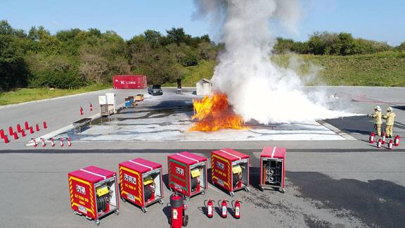 Fire extinguishers and system on display in an outdoor space