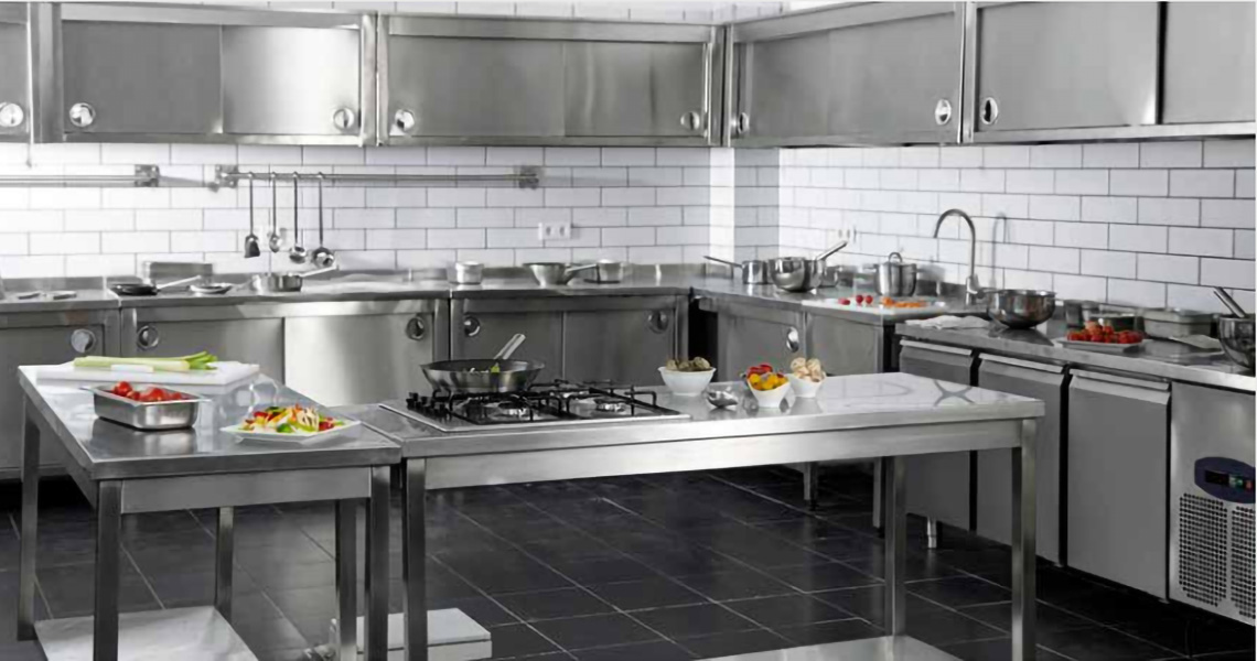 Commercial kitchen with equipments and food on display