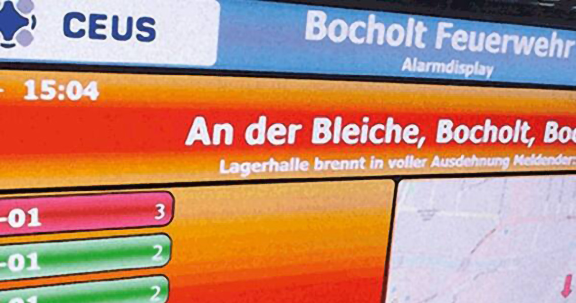 Monitor displaying the user interface of Alarm visualization and control center software for the Bocholt fire department